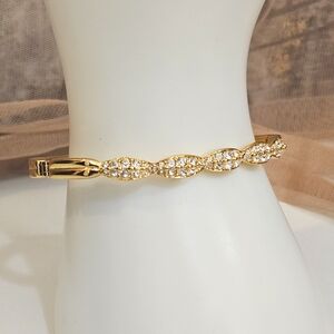 Swarovski Signed Gold Tone Pave Clear Stone Hing Bangle